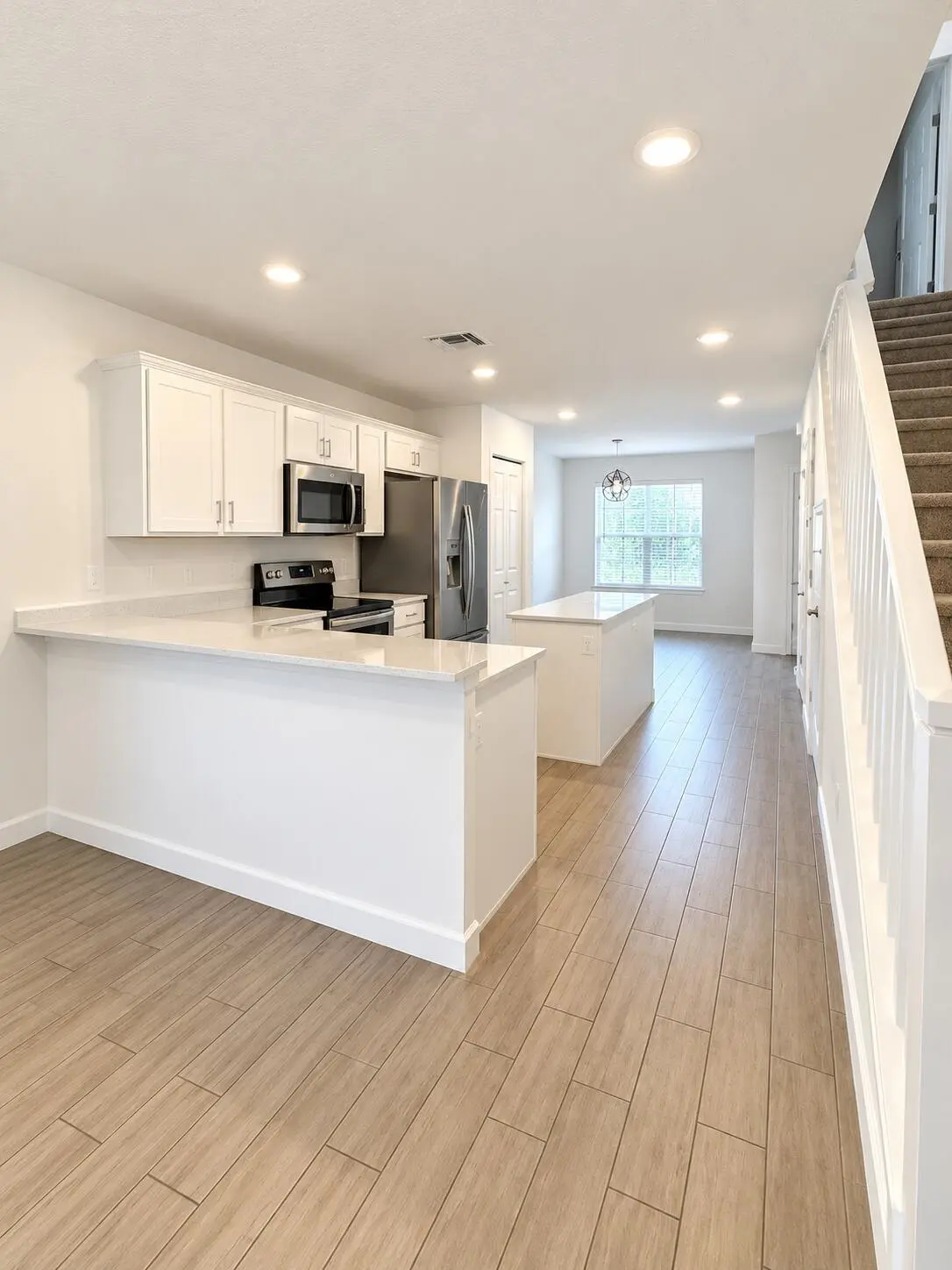 Kitchen back view at 5075 Genove Place, Riviera Beach