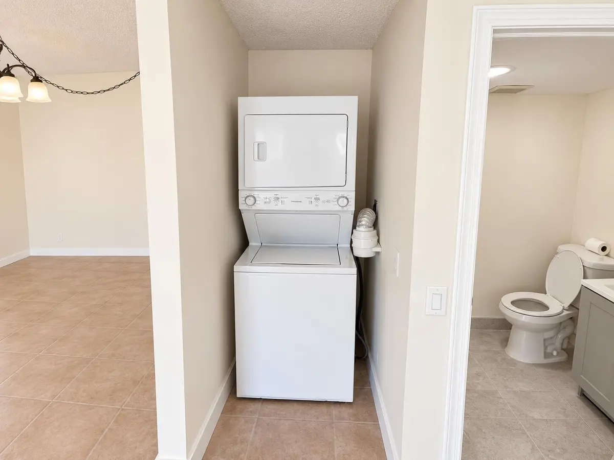 Bright Neutral Laundry Nook Interior at , Boca Raton