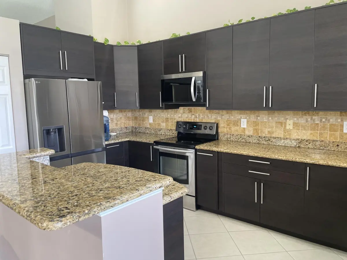 Lago kitchen long view at 9514 Lago Drive, Boynton Beach