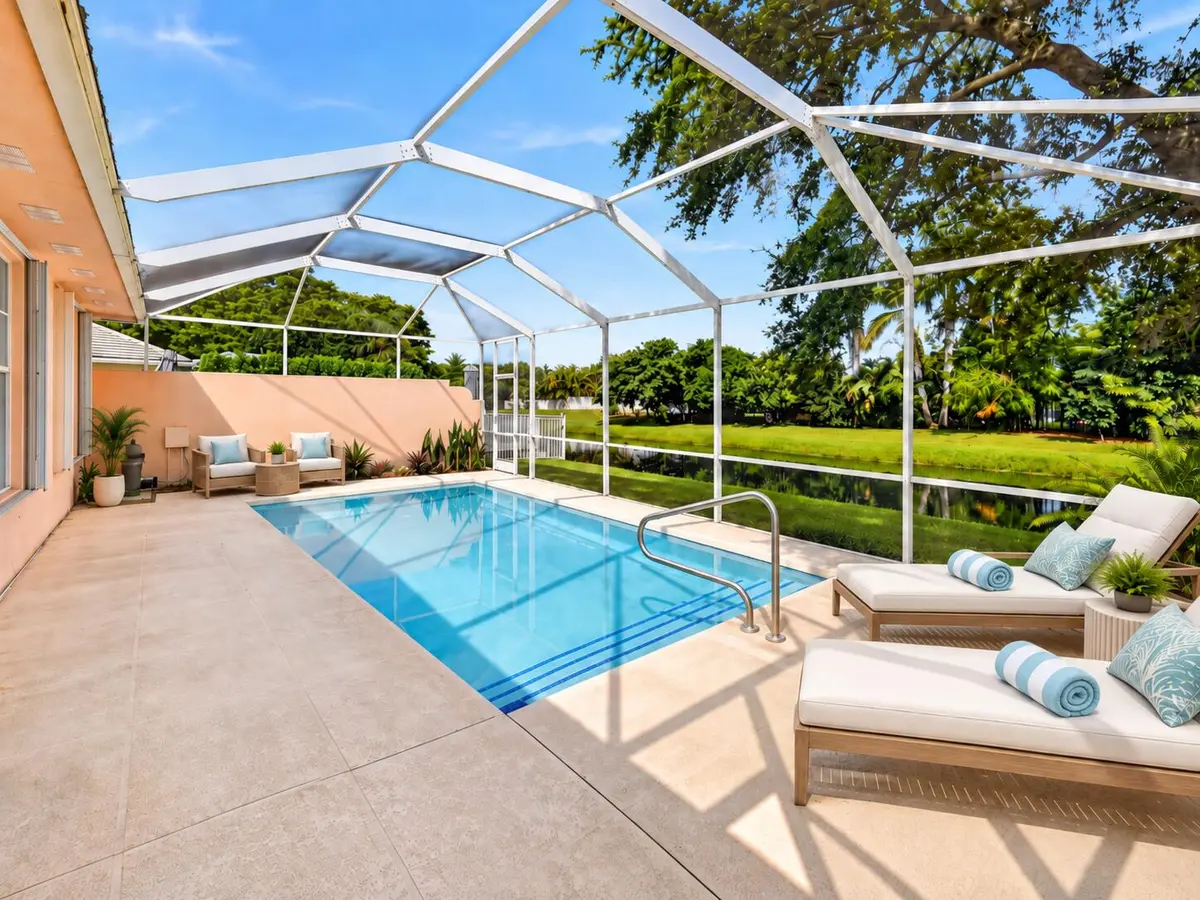 Virtually Staged pool area at 1081 Bedford Avenue, Palm Beach Gardens