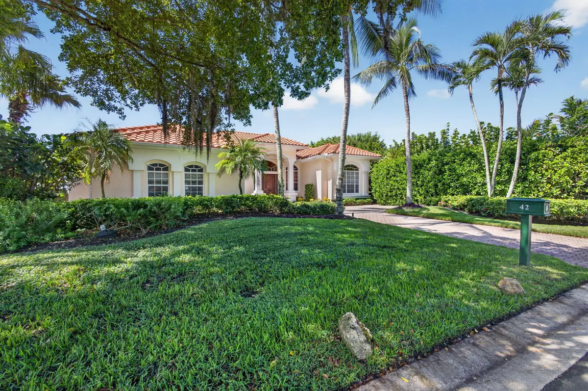 FRONT EXTERIOR at 42 Windward Isle, Palm Beach Gardens