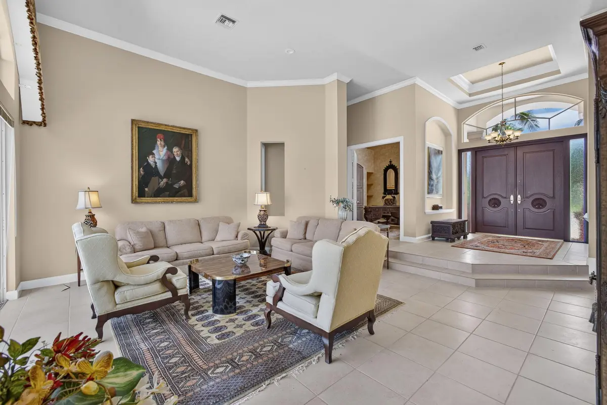 LIVING TO FOYER at 42 Windward Isle, Palm Beach Gardens