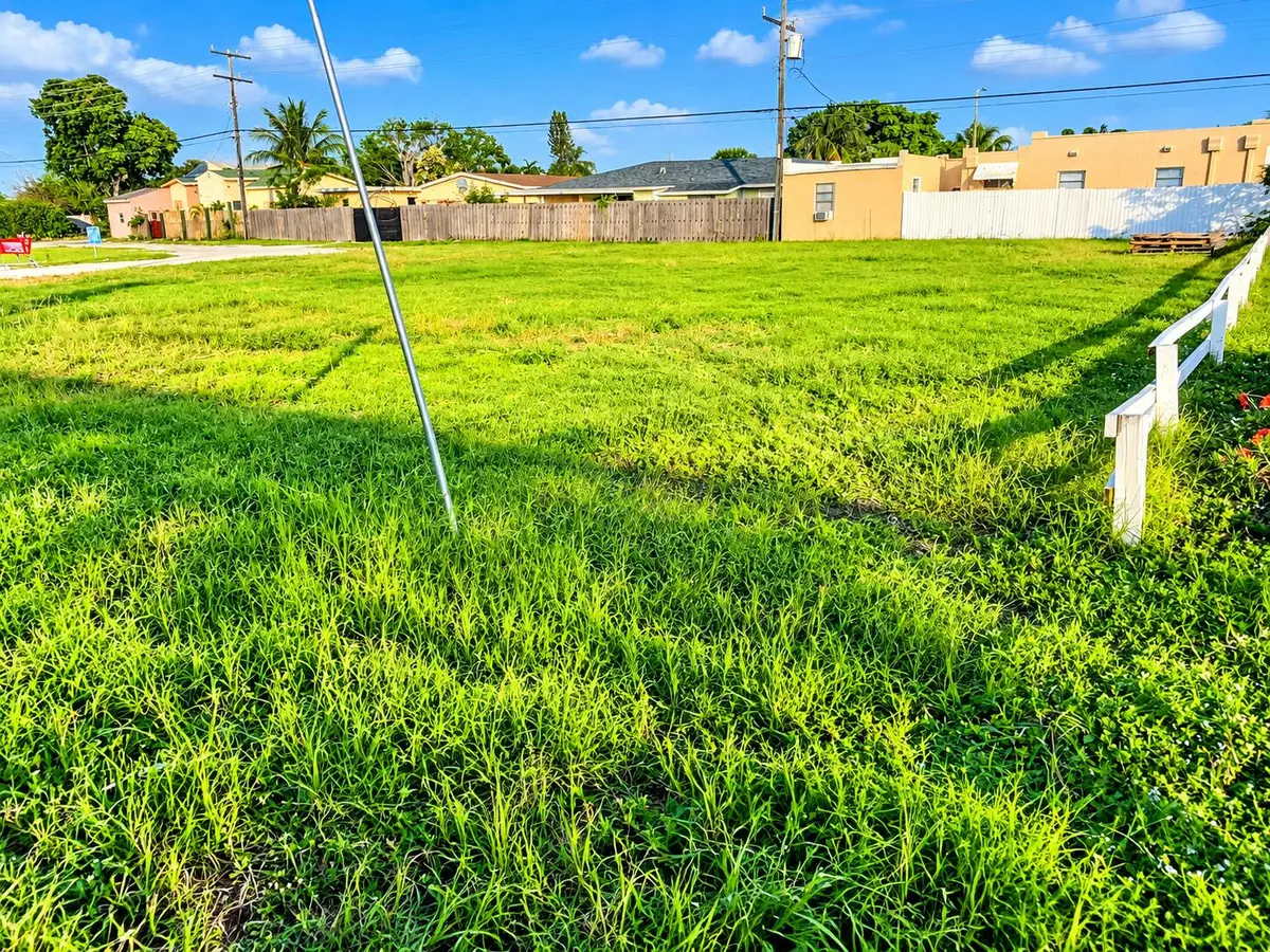 Sunny Suburban Grassy Lot at 1616 N Dixie Highway, Lake Worth Beach