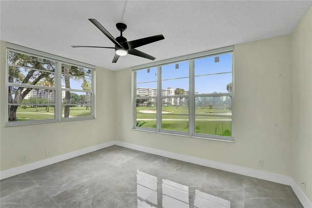 Photo 3 at 3900 Oaks Clubhouse Drive 107, Pompano Beach
