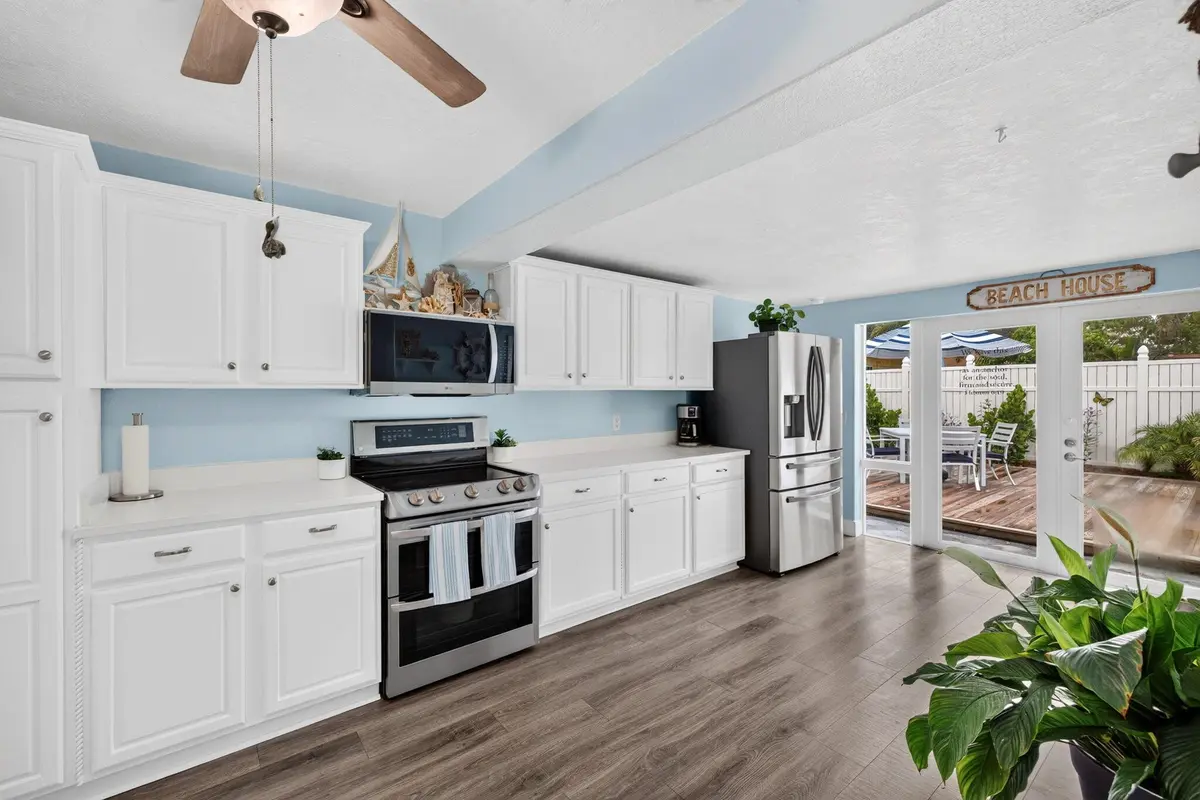 Kitchen with view of back yard at 1131 NE 3rd Street, Pompano Beach