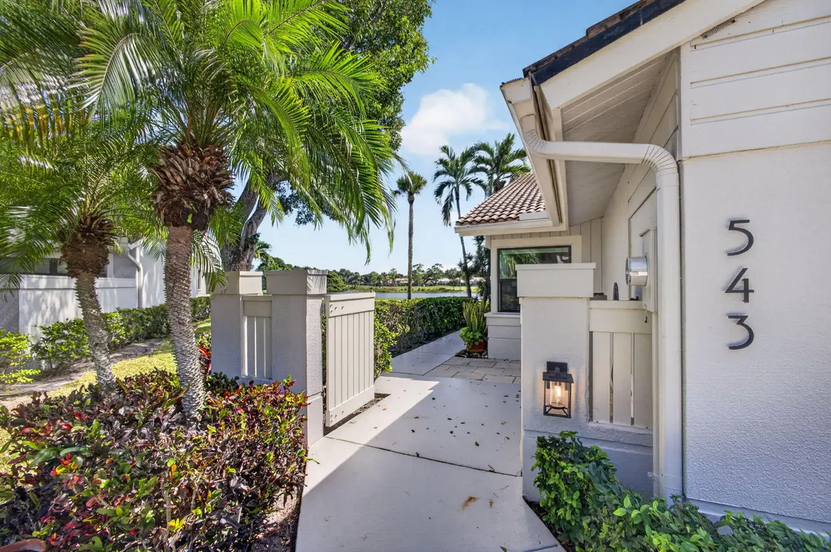 To Entrance at 543 Prestwick Circle, Palm Beach Gardens