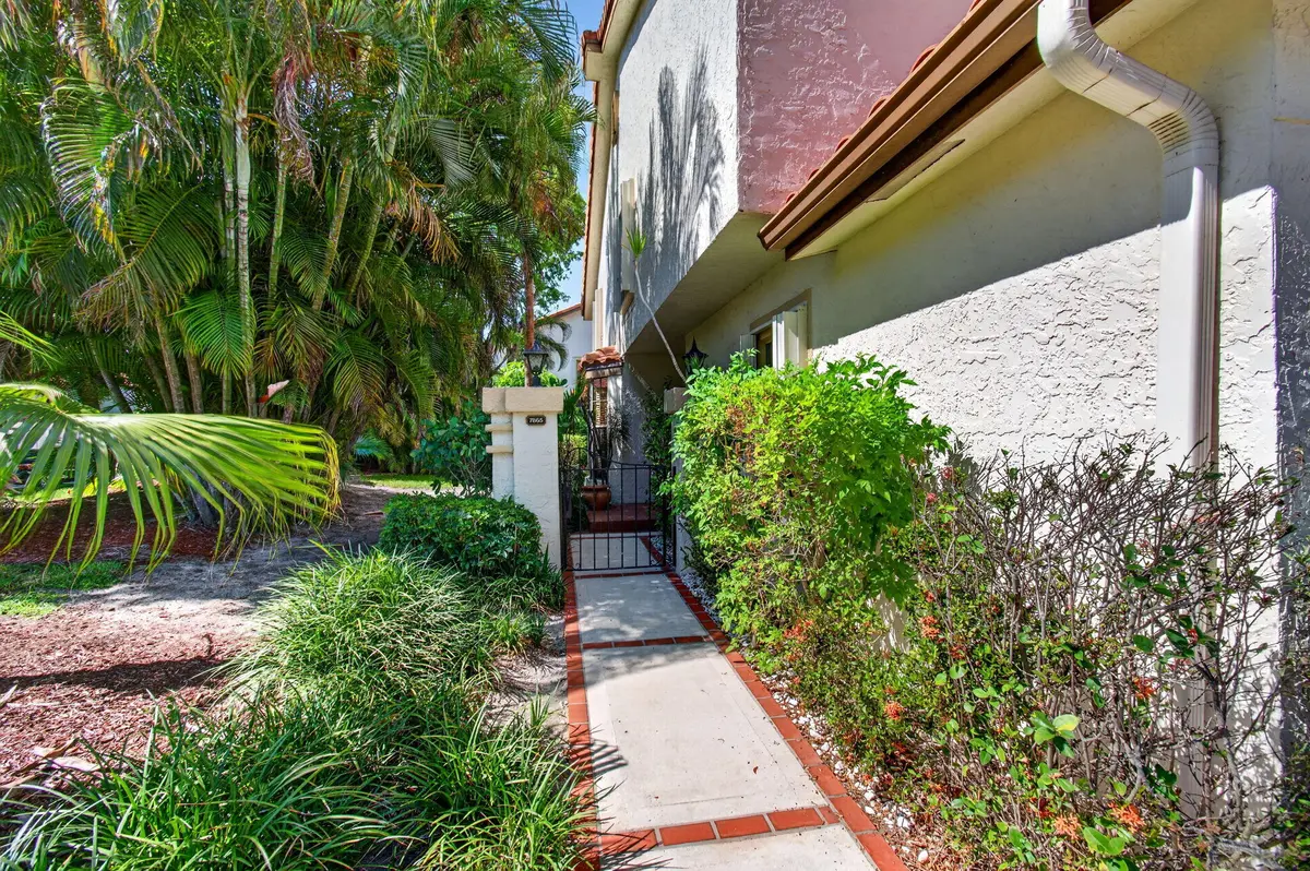 Pathway to side entrance at 7865 LA MIRADA Drive, Boca Raton