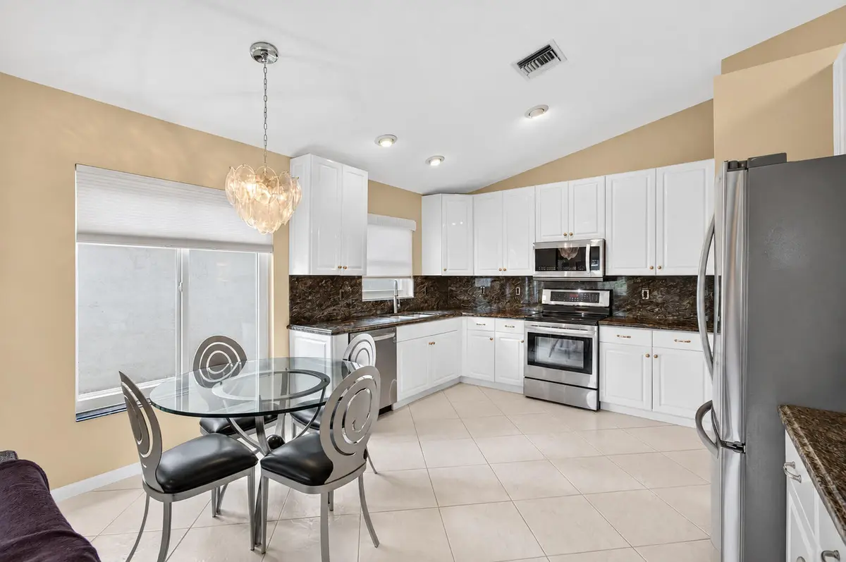 05_Kitchen_and_breakfast_area at 6549 Sun River Road, Boynton Beach