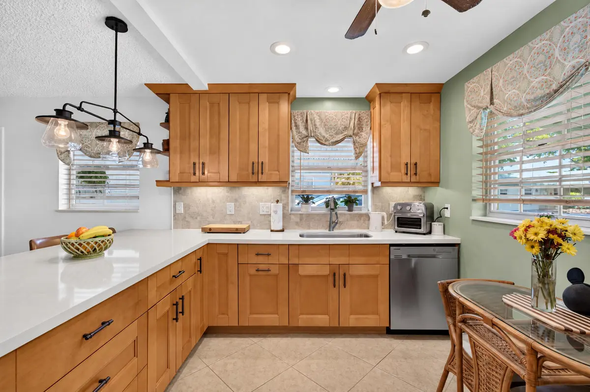 03_kitchen_sink_and_cabinetry_DSC_9016 at 842 Meadowlark Lane, Delray Beach
