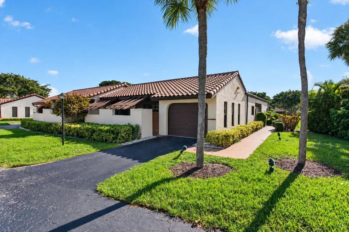 01_Front_exterior at 21923 Arriba Real, Boca Raton