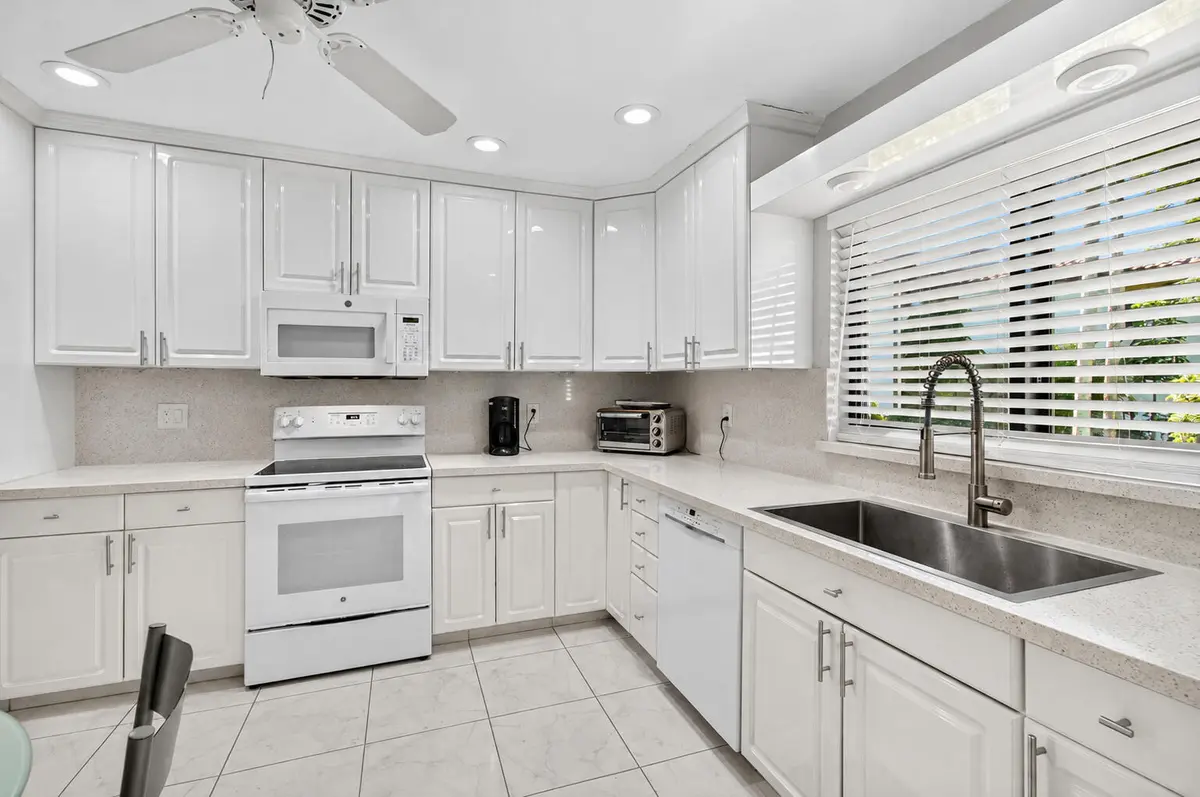 04_Kitchen_sink_and_range at 21923 Arriba Real, Boca Raton