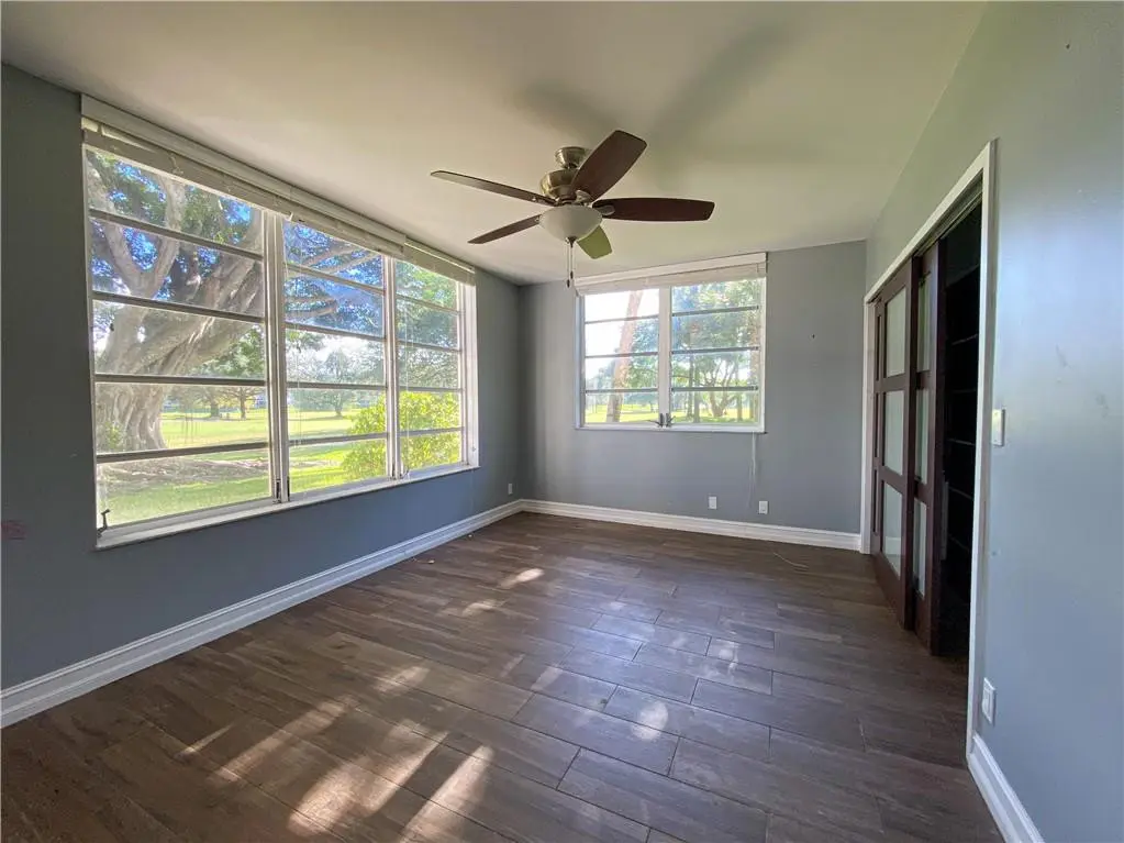 Photo 6 at 3900 Oaks Clubhouse Drive 106, Pompano Beach