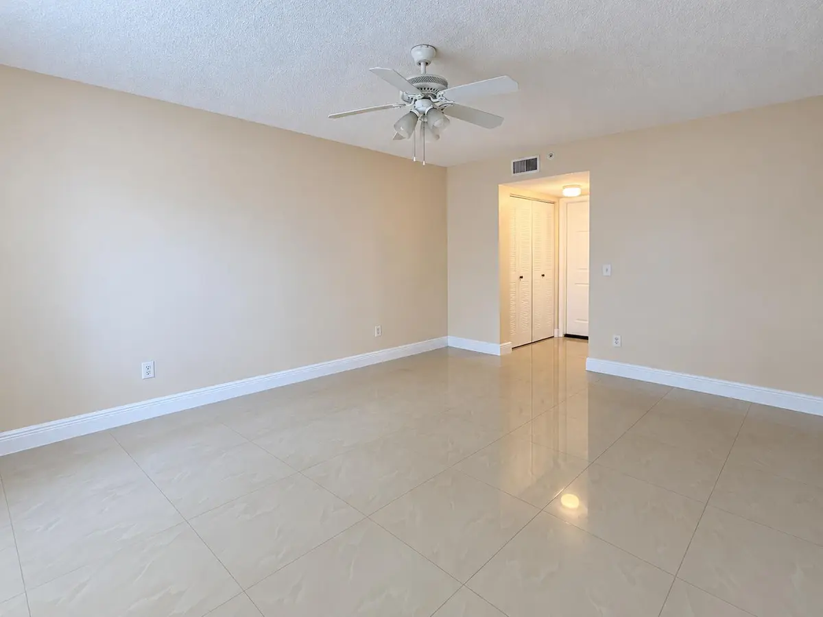 Empty Beige Room with Ceiling Fan and Al at 2620 S UNIVERSITY Drive 311, Davie
