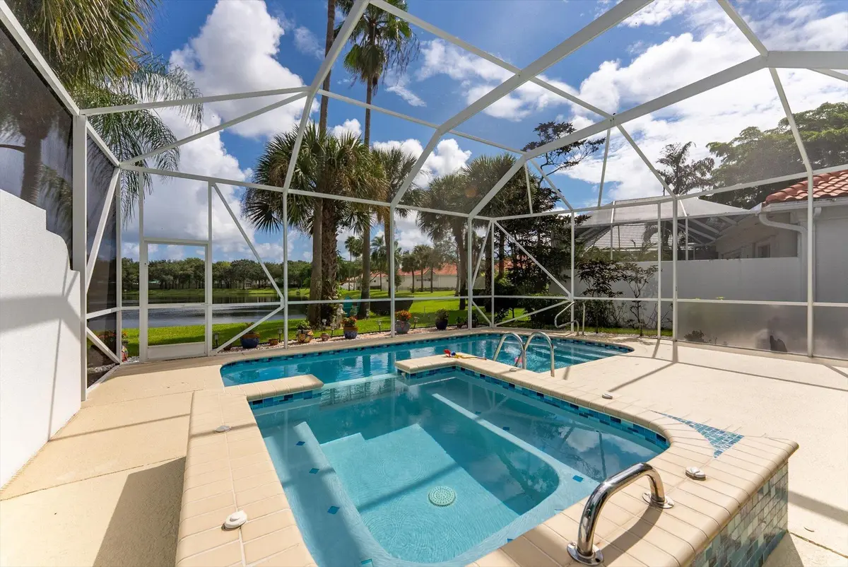 Pool + Spa with Lake Views at 2067 Valencia Drive, Delray Beach