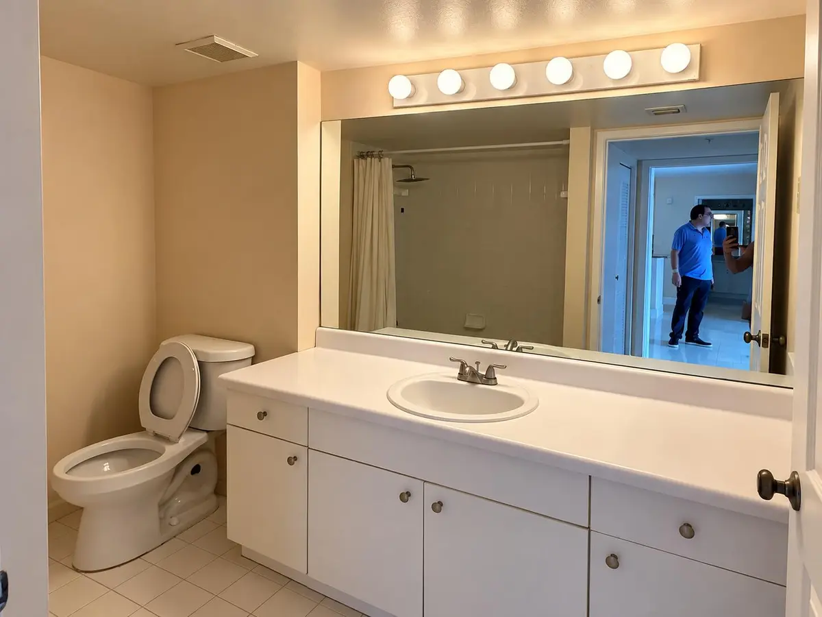 Warm Beige Bathroom with Seven Globe Lig at 2620 S UNIVERSITY Drive 311, Davie