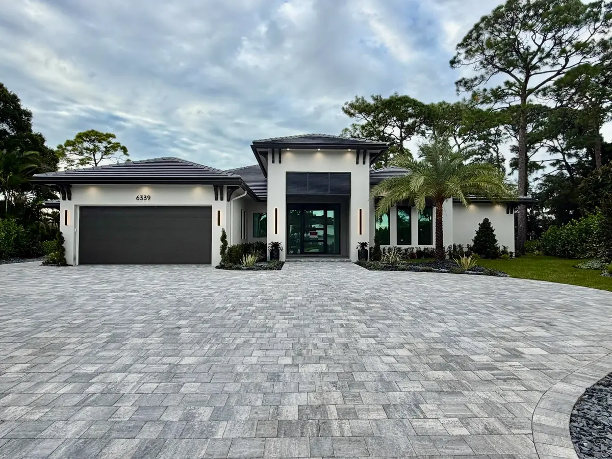 Front of house at 6339 WOODTHRUSH Court, Palm Beach Gardens