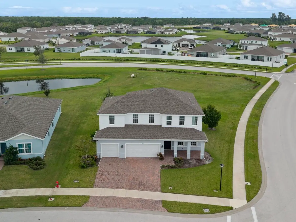 70-web-or-mls-DJI_20261006115931_0080_D at 6555 POMELLO Court, Vero Beach