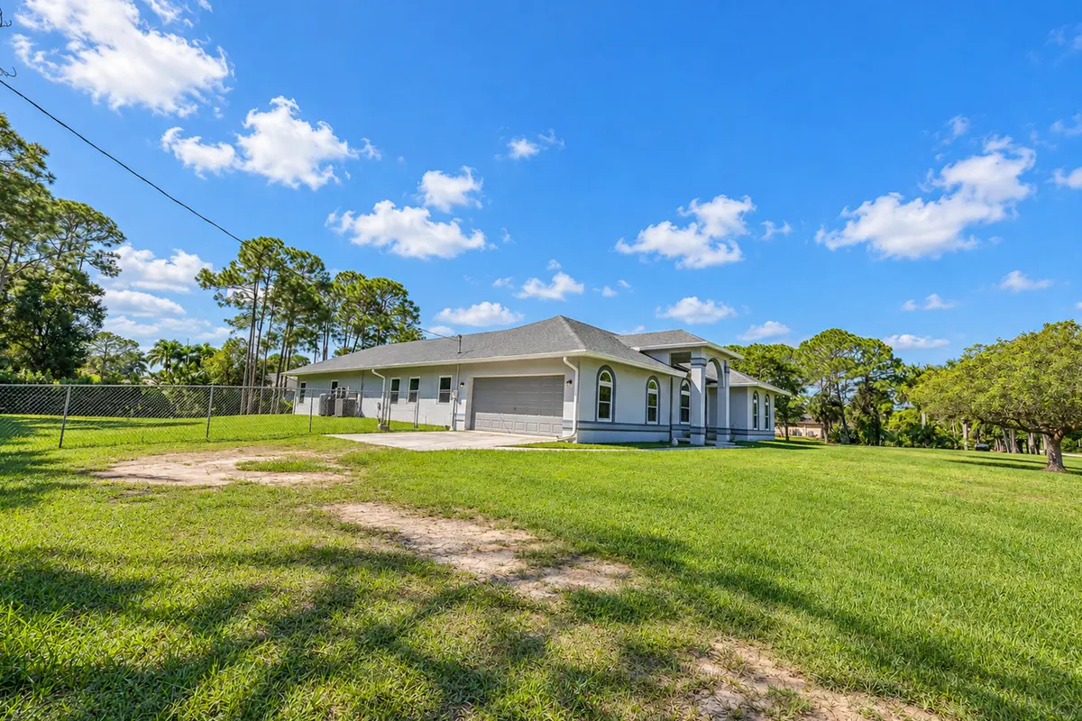 Front of house at 17226 79th Court, The Acreage
