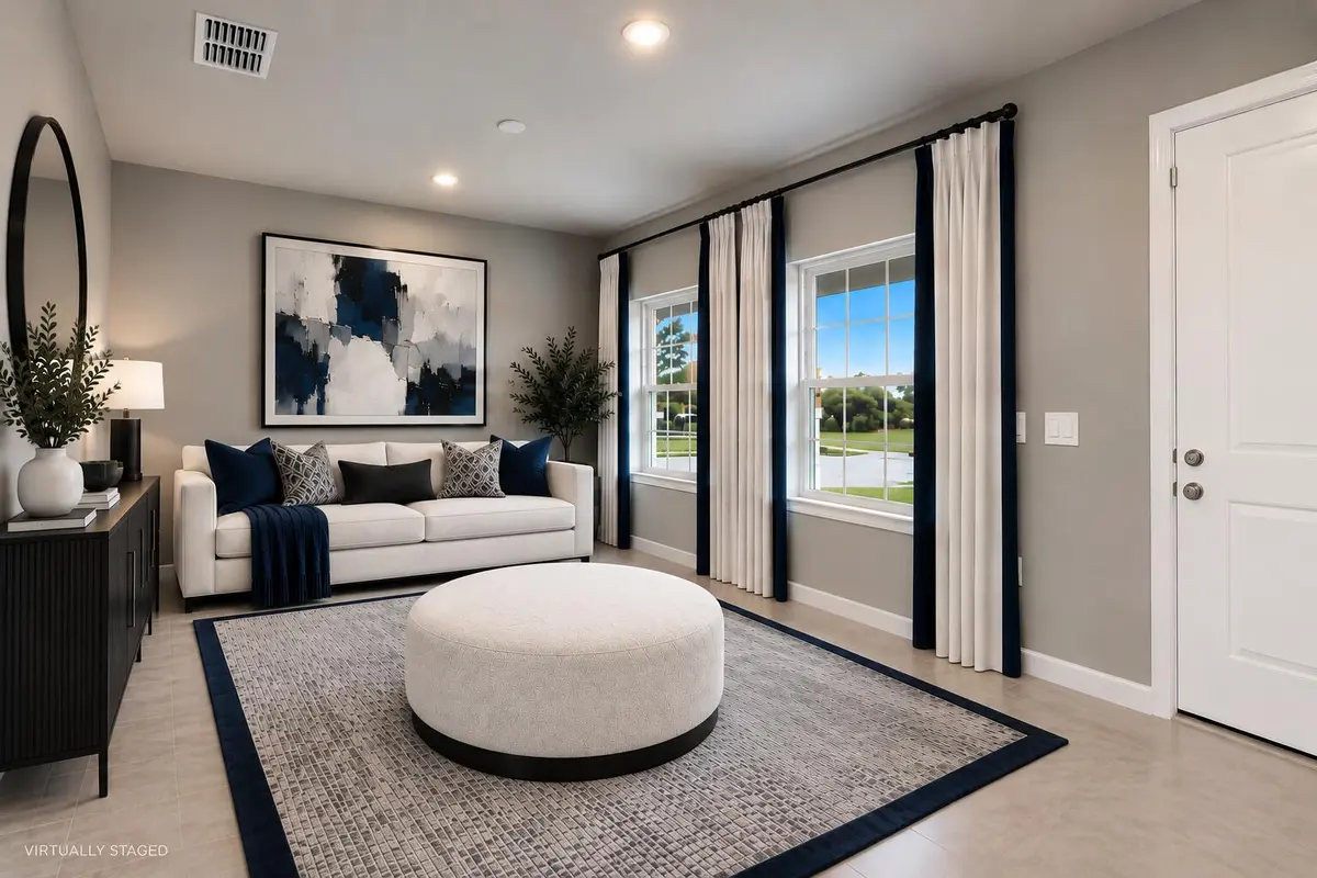 Modern Navy and Gray Living Room at 6555 POMELLO Court, Vero Beach