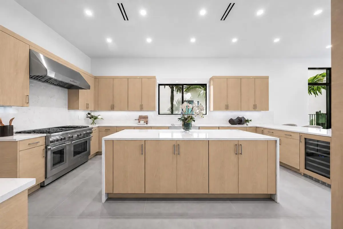 Oak-trimmed wine cooler, uninterrupted i at 16717 MOSAIC Place, Delray Beach