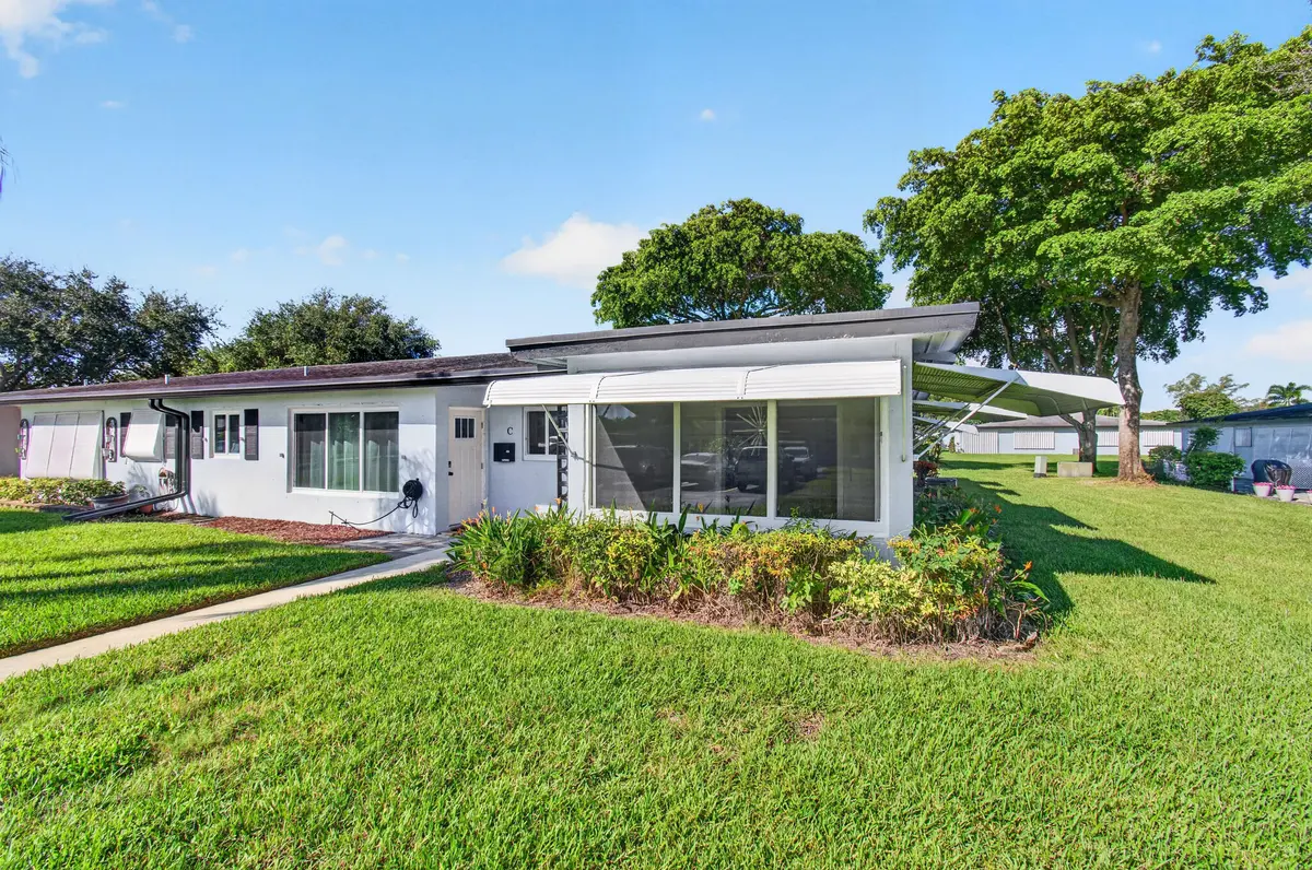 01_Front_exterior_Original at 455 High Point Boulevard D, Delray Beach