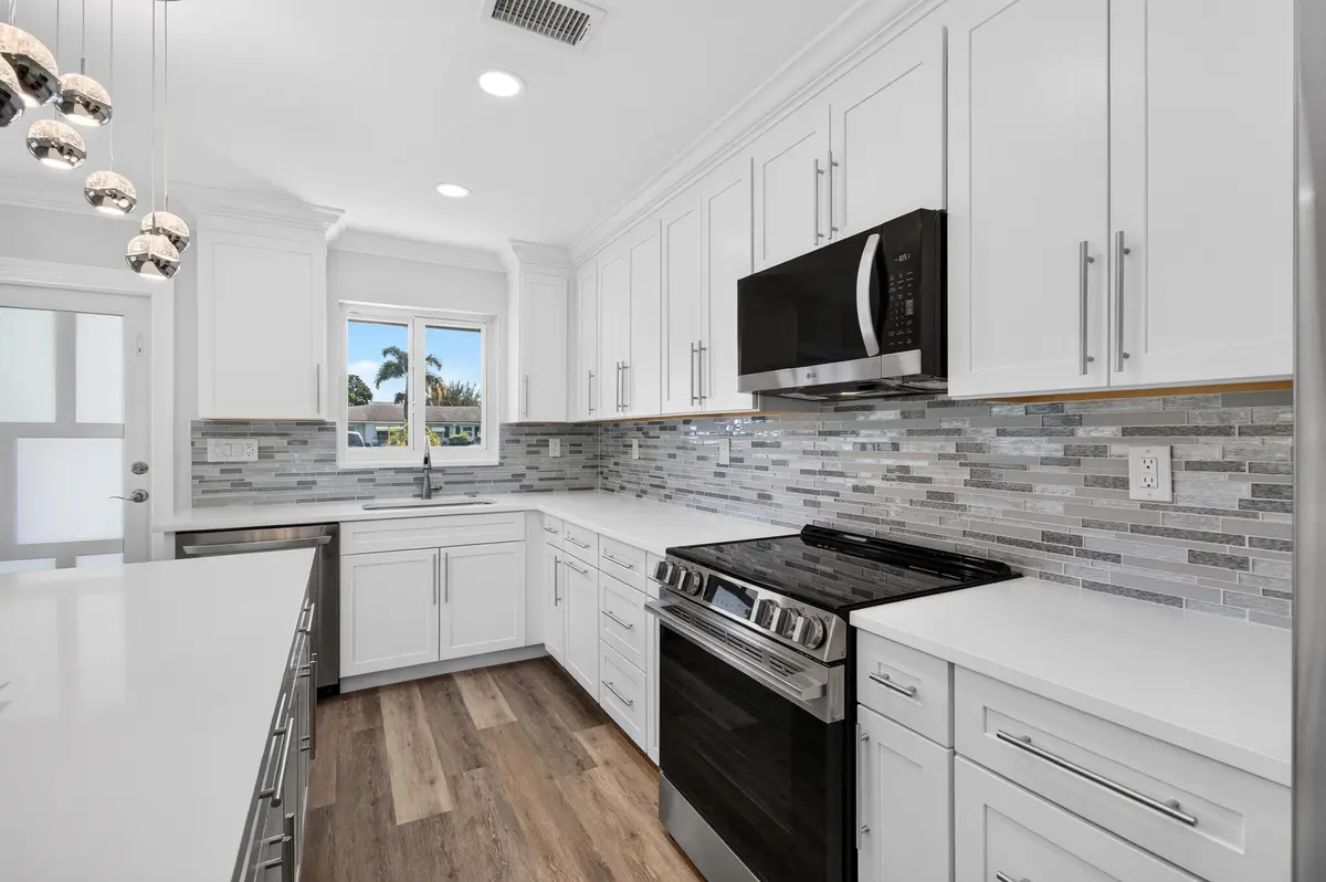 03_Kitchen_second_angle_Original at 455 High Point Boulevard D, Delray Beach