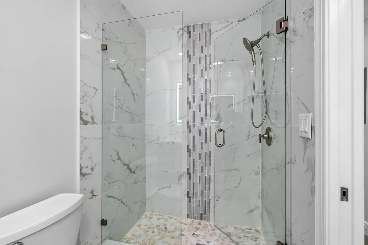 08_Bathroom_1_shower_Original at 455 High Point Boulevard D, Delray Beach