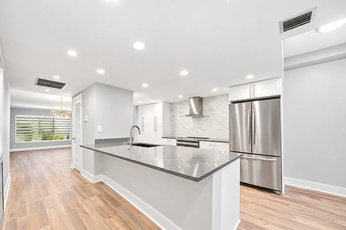 Modern Open-Concept Kitchen and Living S at 730 GREENSWARD Court 108-J, Delray Beach