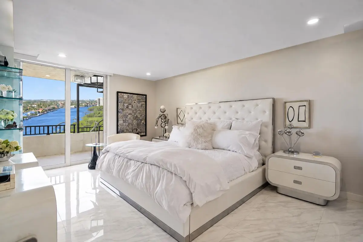 Modern Bedroom with Waterfront Balcony V at 3912 S Ocean Boulevard PH-1, Highland Beach