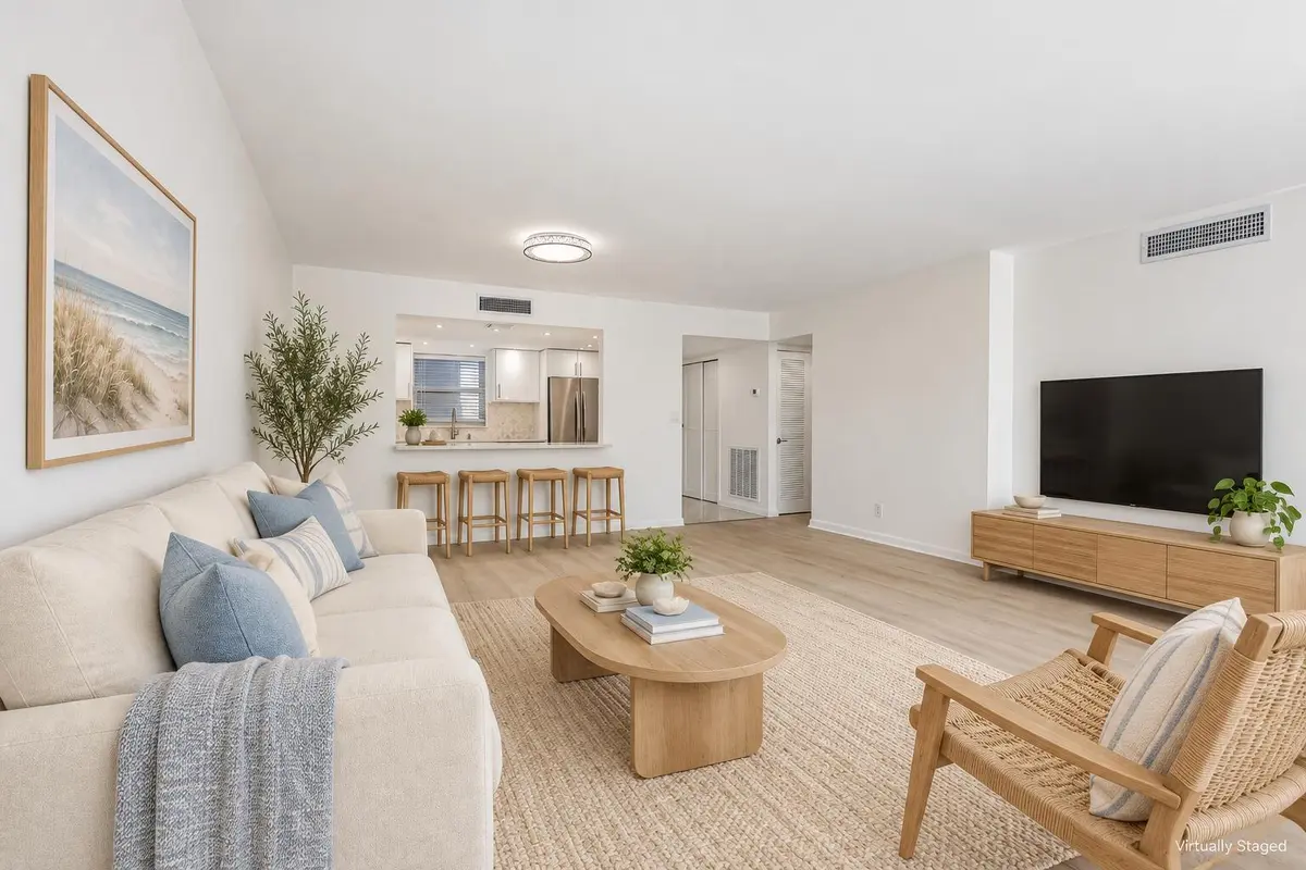 Virtually Staged Living Room at 711 N Birch Road 204, Fort Lauderdale