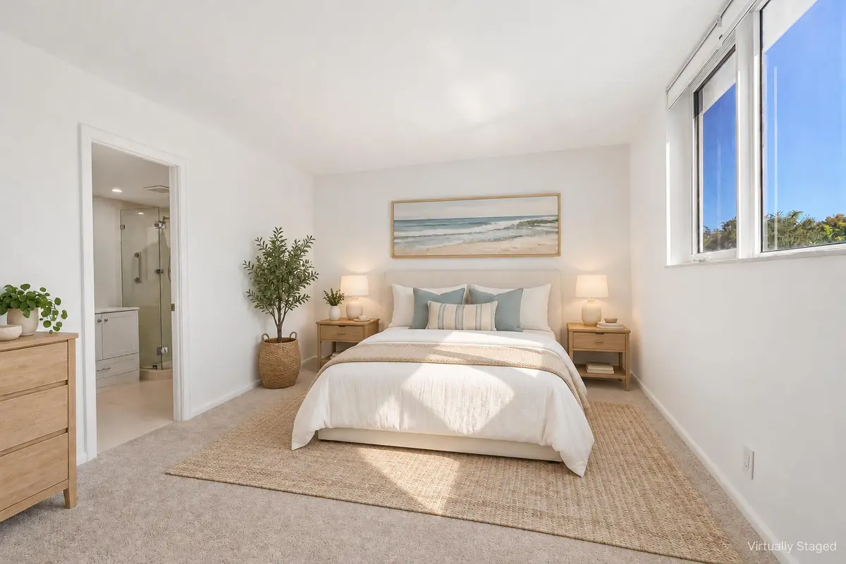Primary Bedroom Virtually Staged at 711 N Birch Road 204, Fort Lauderdale