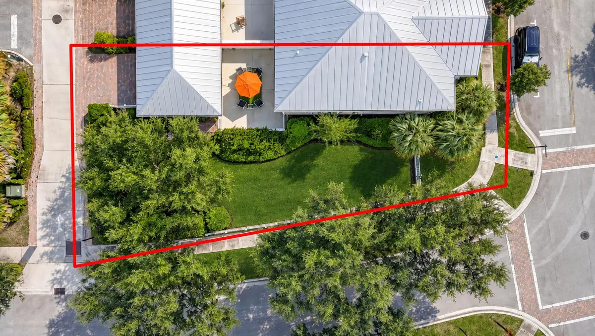 Red-Bordered Corner Home Aerial View at 1043 Key Largo Street, Jupiter