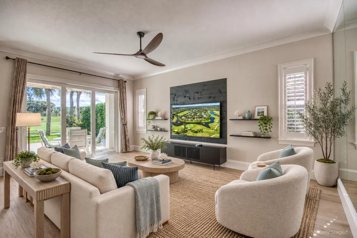 Virtually staged coastal living room at 246 Barbados Drive, Jupiter