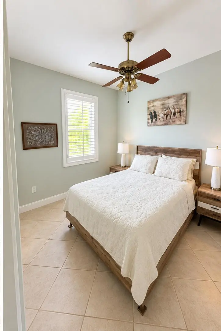 bright_bedroom_photo_2 at 7844 154th Court, Palm Beach Gardens