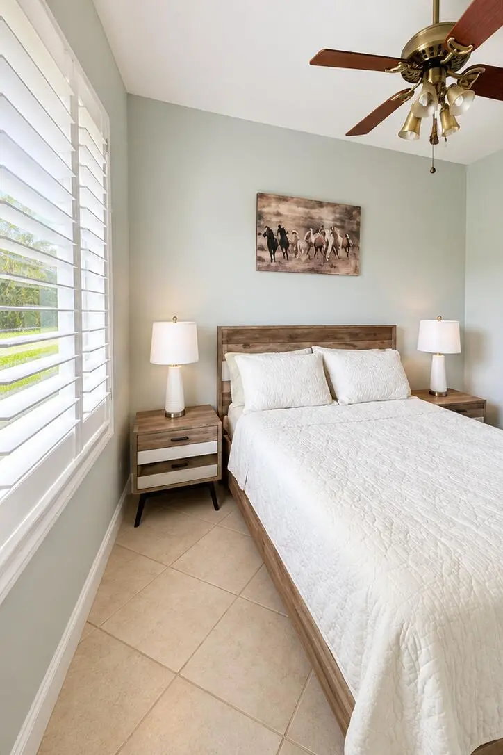 bright_bedroom_photo_1 at 7844 154th Court, Palm Beach Gardens