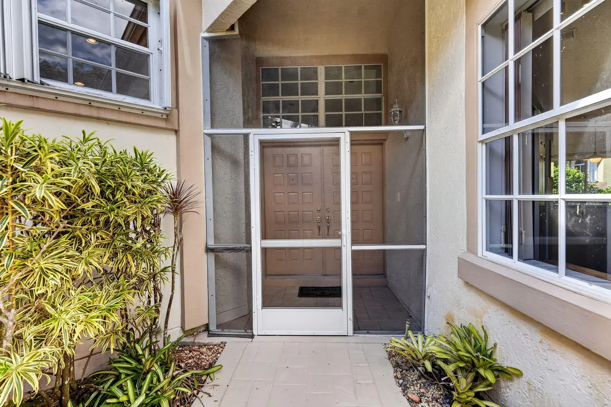 exterior door at 12850 Oak Knoll Drive, Palm Beach Gardens
