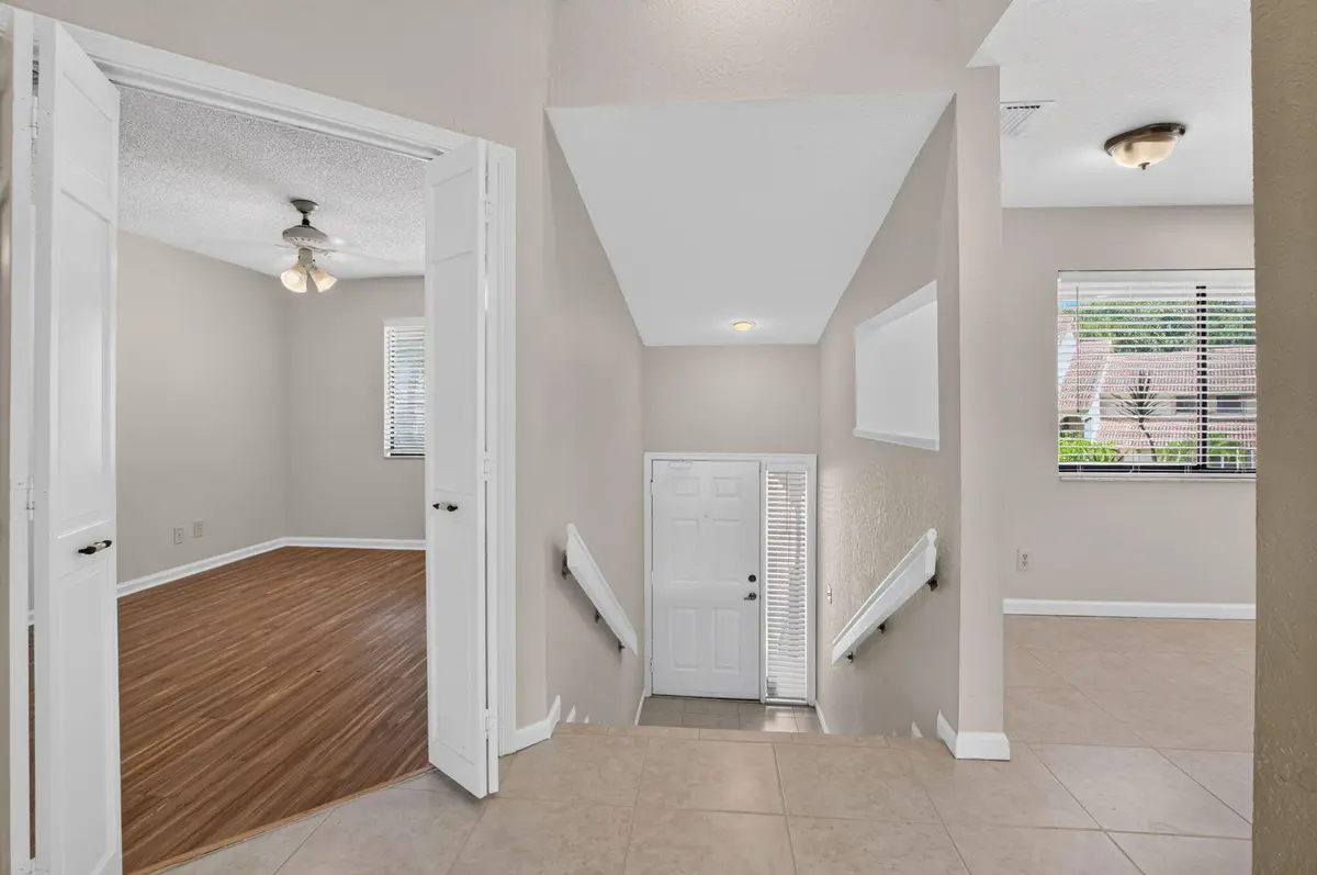 INVITING ENTRY at 5621 Coach House Circle, Boca Raton