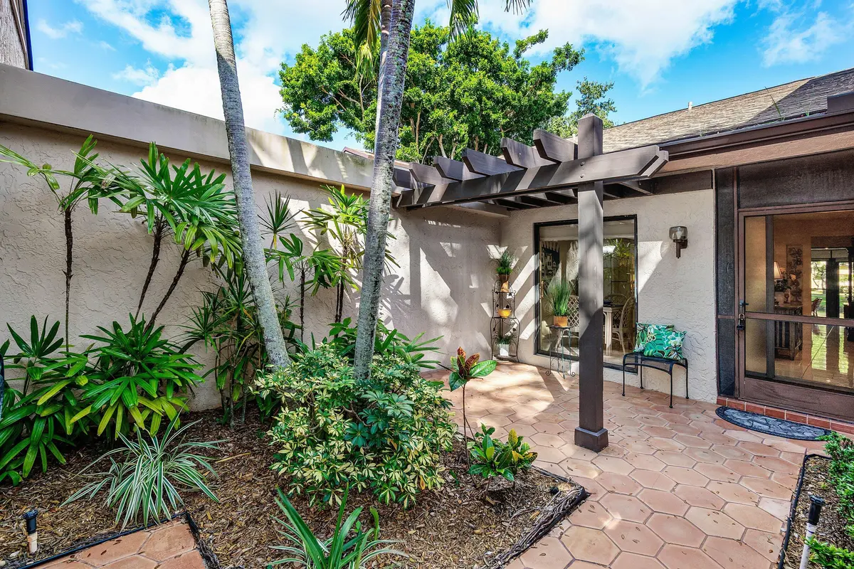 Private Courtyard at 5265 FAIRWAY WOODS Drive 3112, Delray Beach