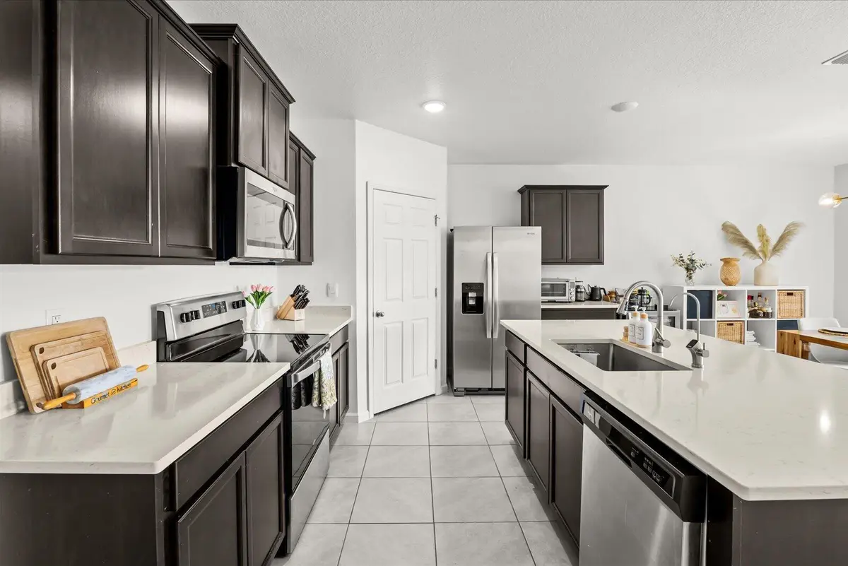 Kitchen with walk in pantry at 4589 SW Uleta Street, Port St. Lucie