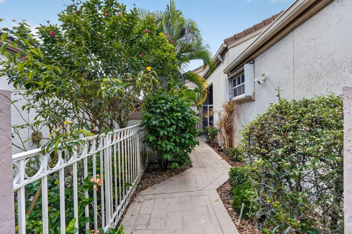 path to house at 12850 Oak Knoll Drive, Palm Beach Gardens
