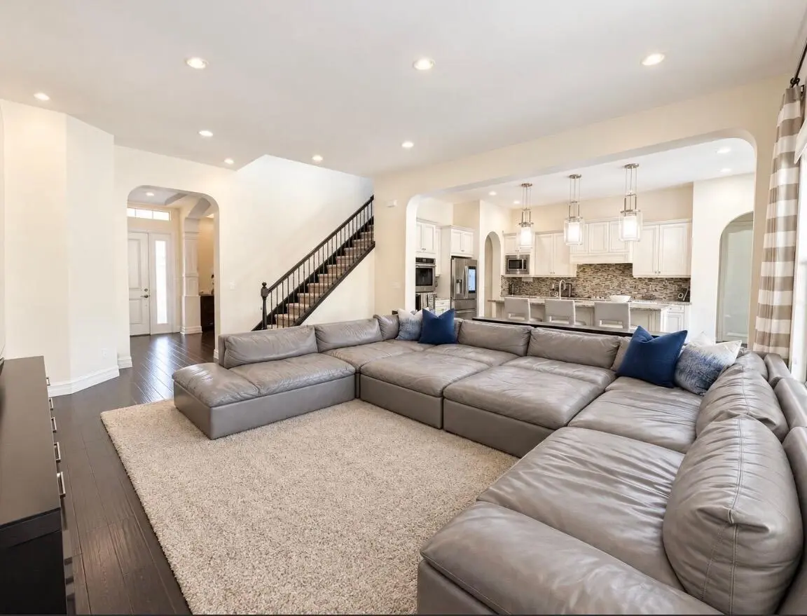 Family room to kitchen at 8177 SE Red Root Way, Jupiter
