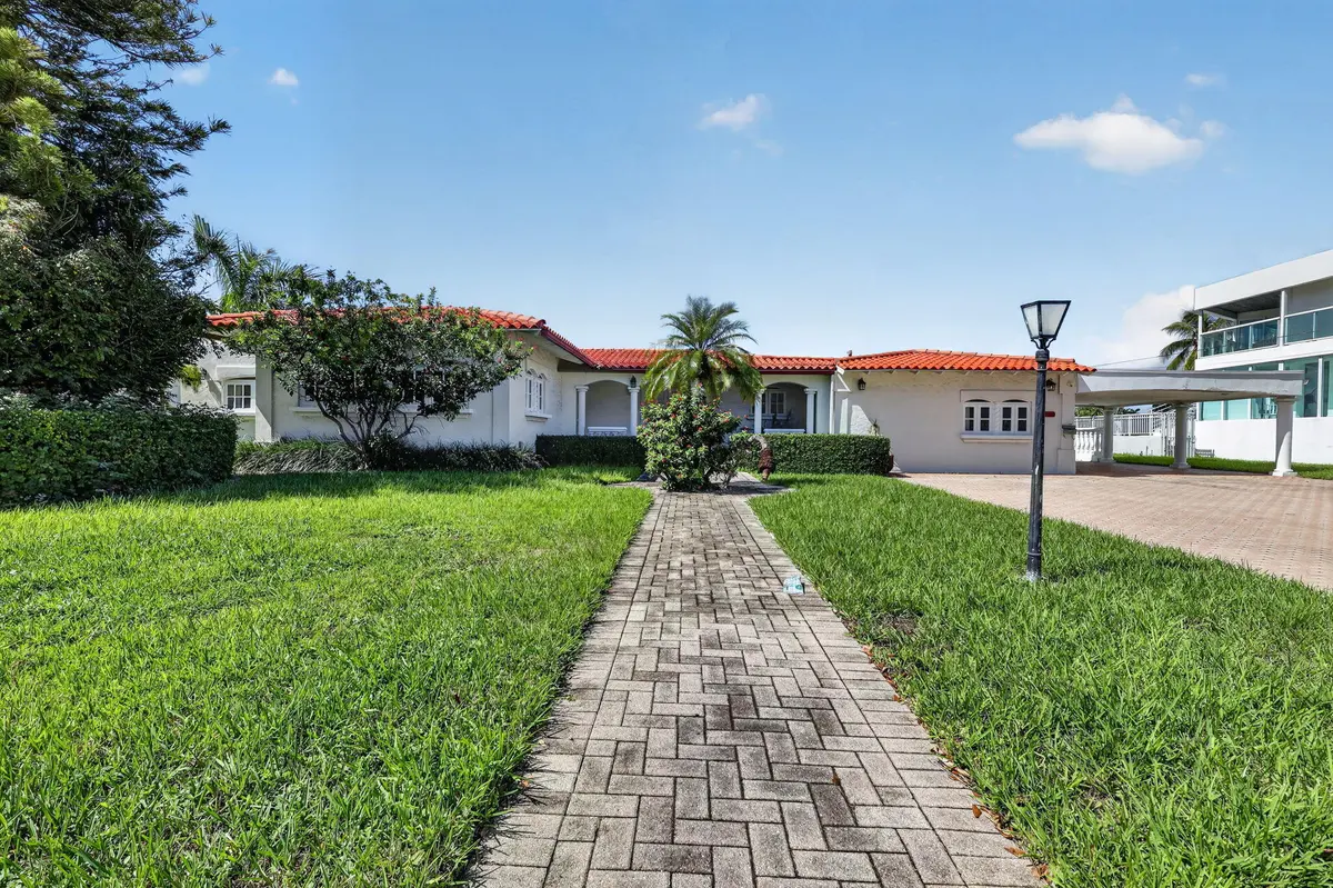 Front of Structure at 7500 W TREASURE Drive, North Bay Village