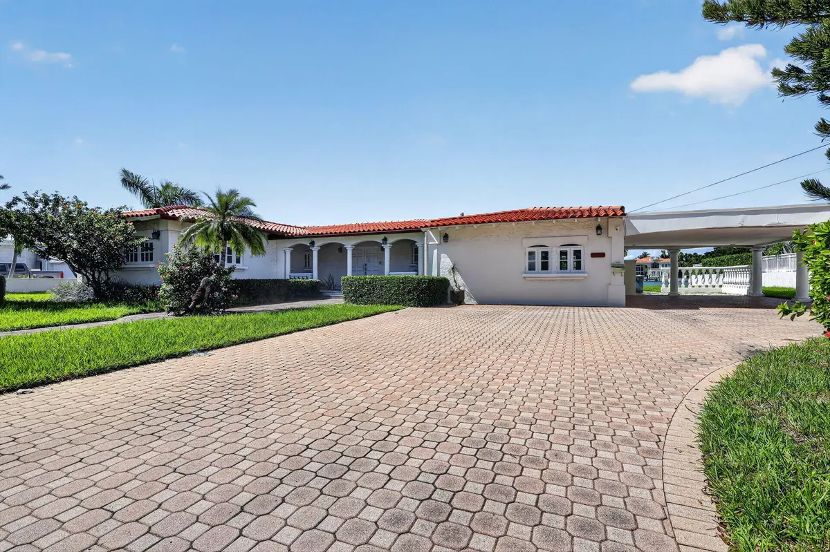 Front of Structure at 7500 W TREASURE Drive, North Bay Village