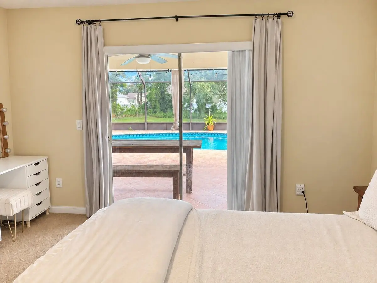 06-Bedroom-and-Patio-View at 194 SW Voltair Terrace, Port St. Lucie