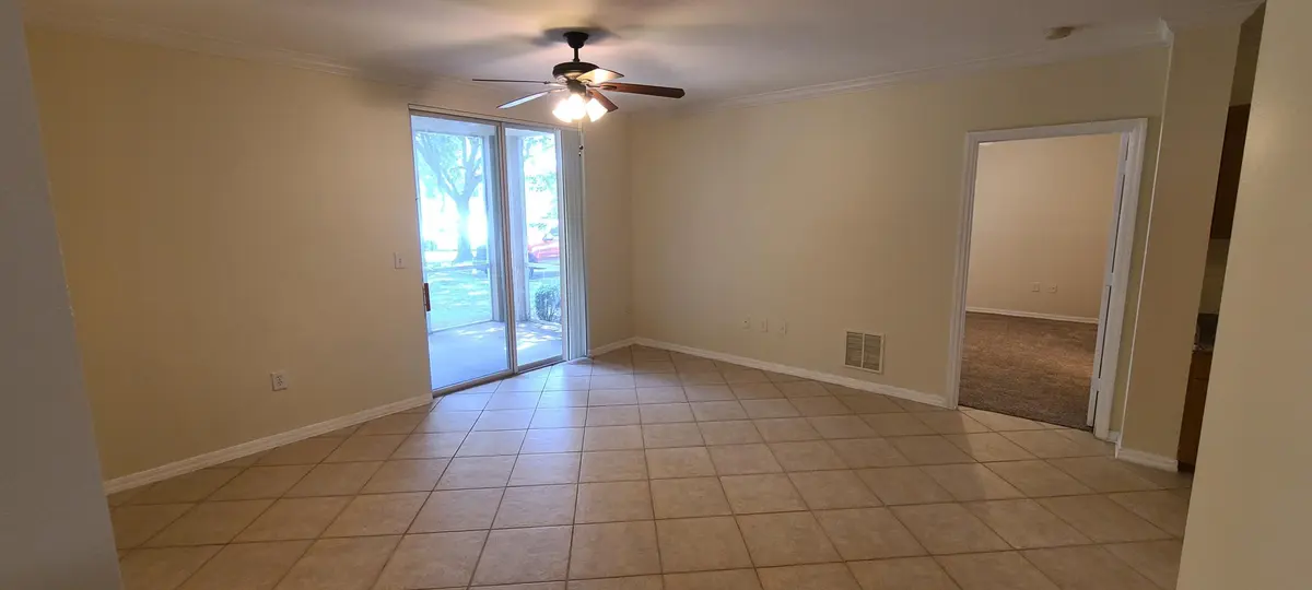 Family Room at 6426 Emerald Dunes Drive 105, West Palm Beach