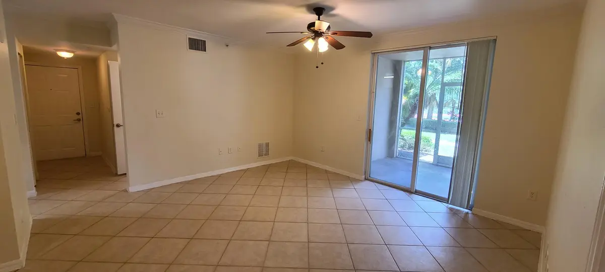 Family Room at 6426 Emerald Dunes Drive 105, West Palm Beach