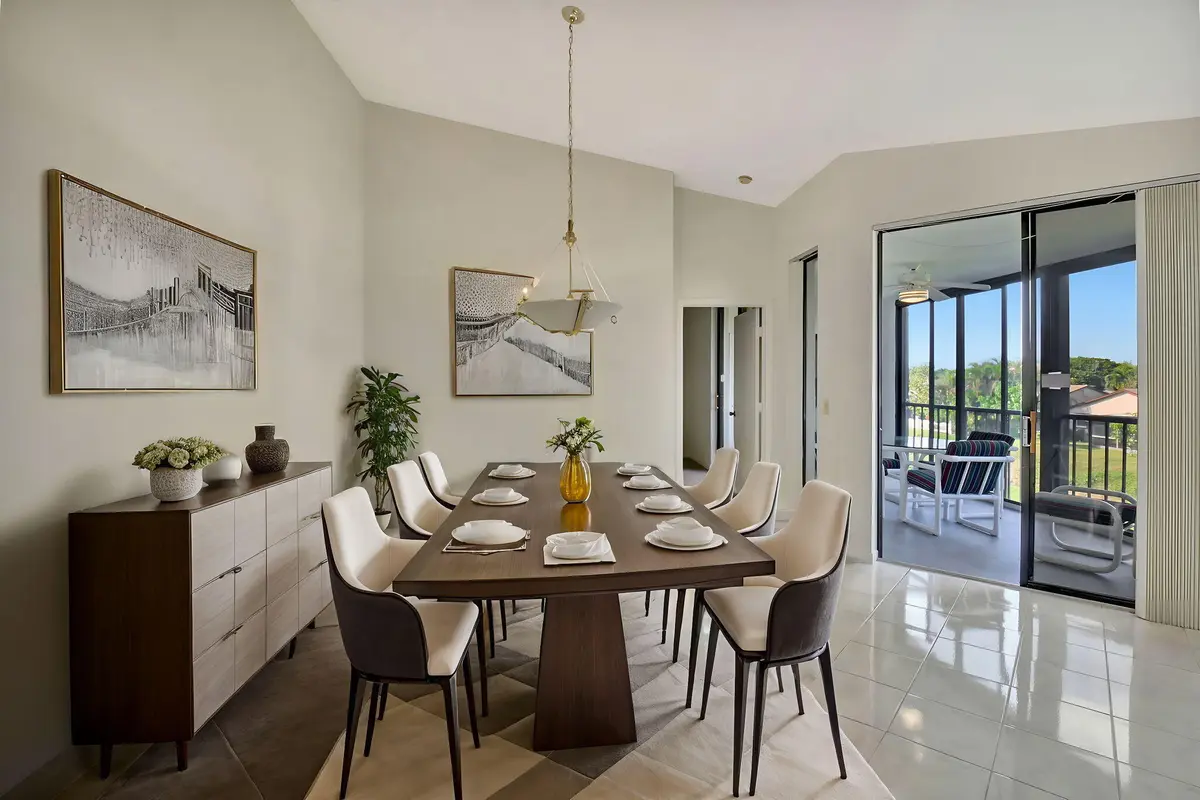Virtually Staged Formal Dining Area at 5195 Europa Drive M, Boynton Beach