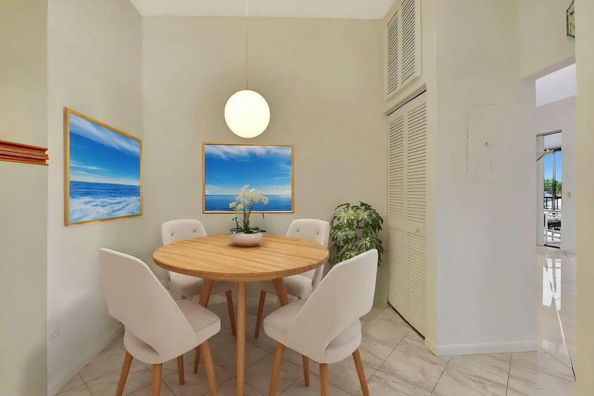 Virtually Staged Eat-In Kitchen at 5195 Europa Drive M, Boynton Beach