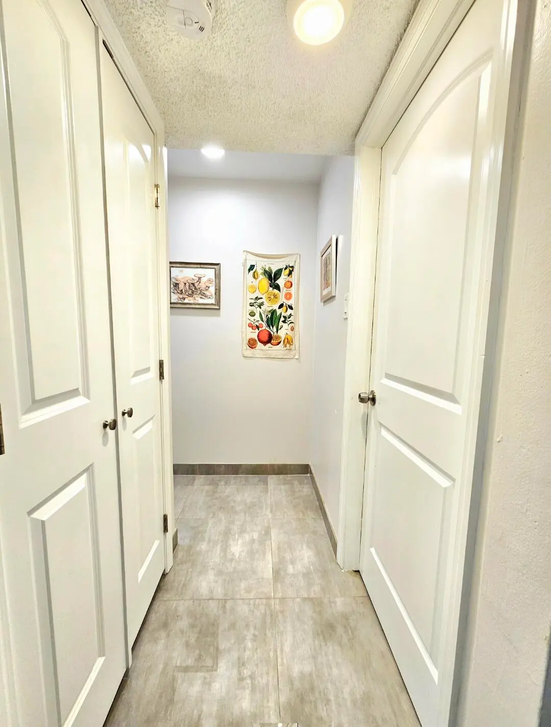 HALLWAY TO BATHROOM at 651 LYONS Road 10107, Coconut Creek