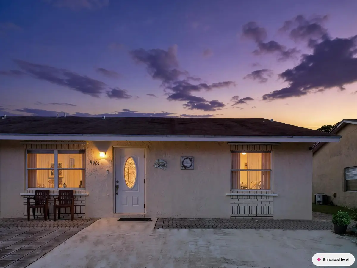 Front Dusk at 4966 PIMLICO Court, West Palm Beach